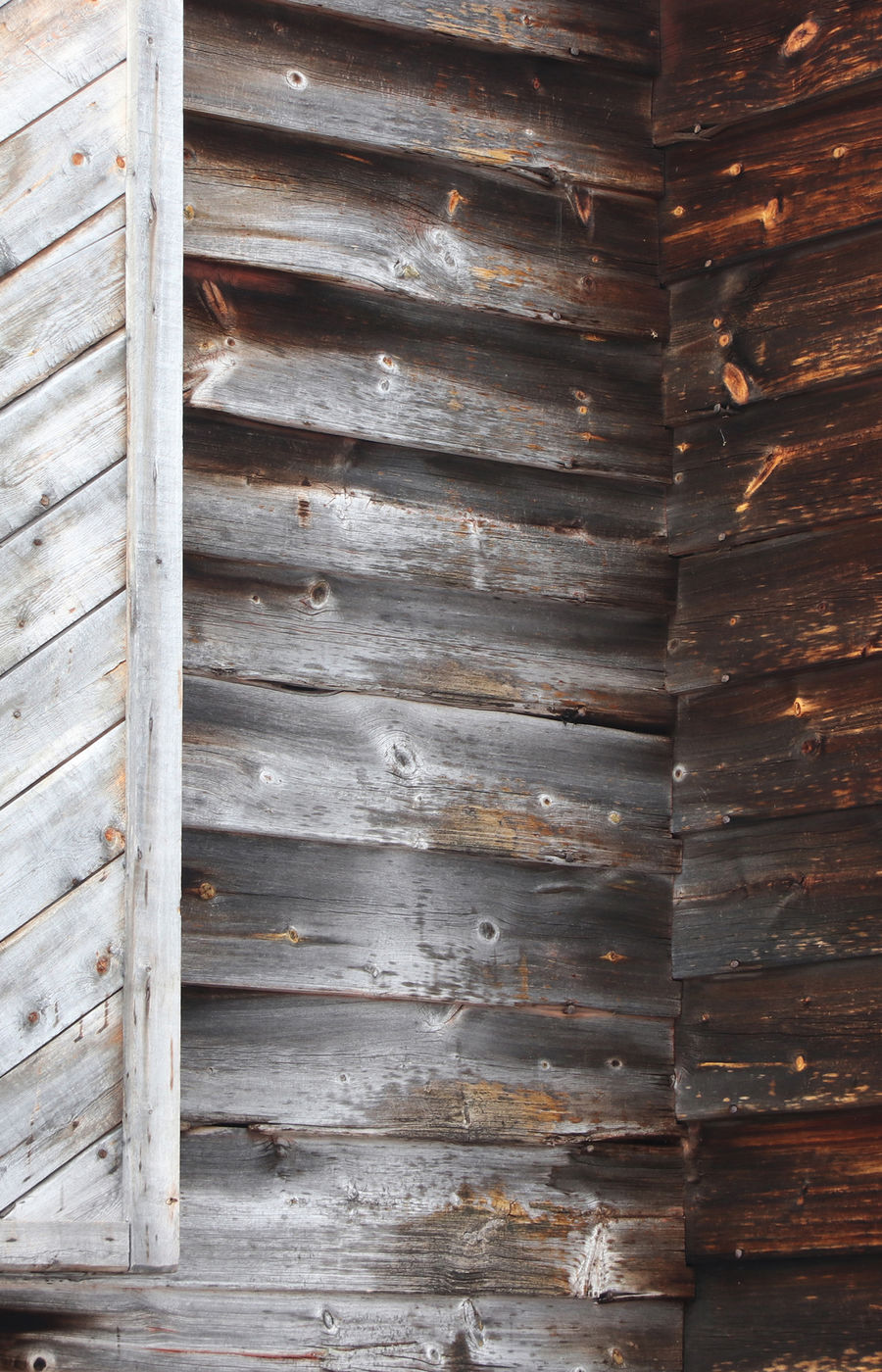 Close-up of a wooden building, antiqued by weather and natural aging.