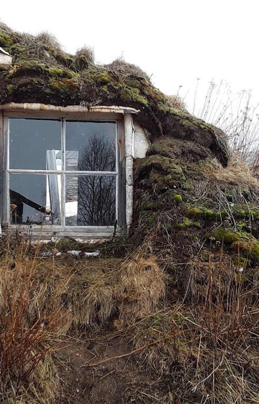 Glass window in a small hill, an example of indigenous architecture.
