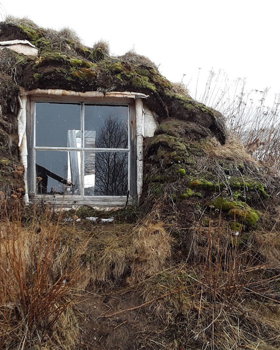 Glass window in a small hill, an example of indigenous architecture.