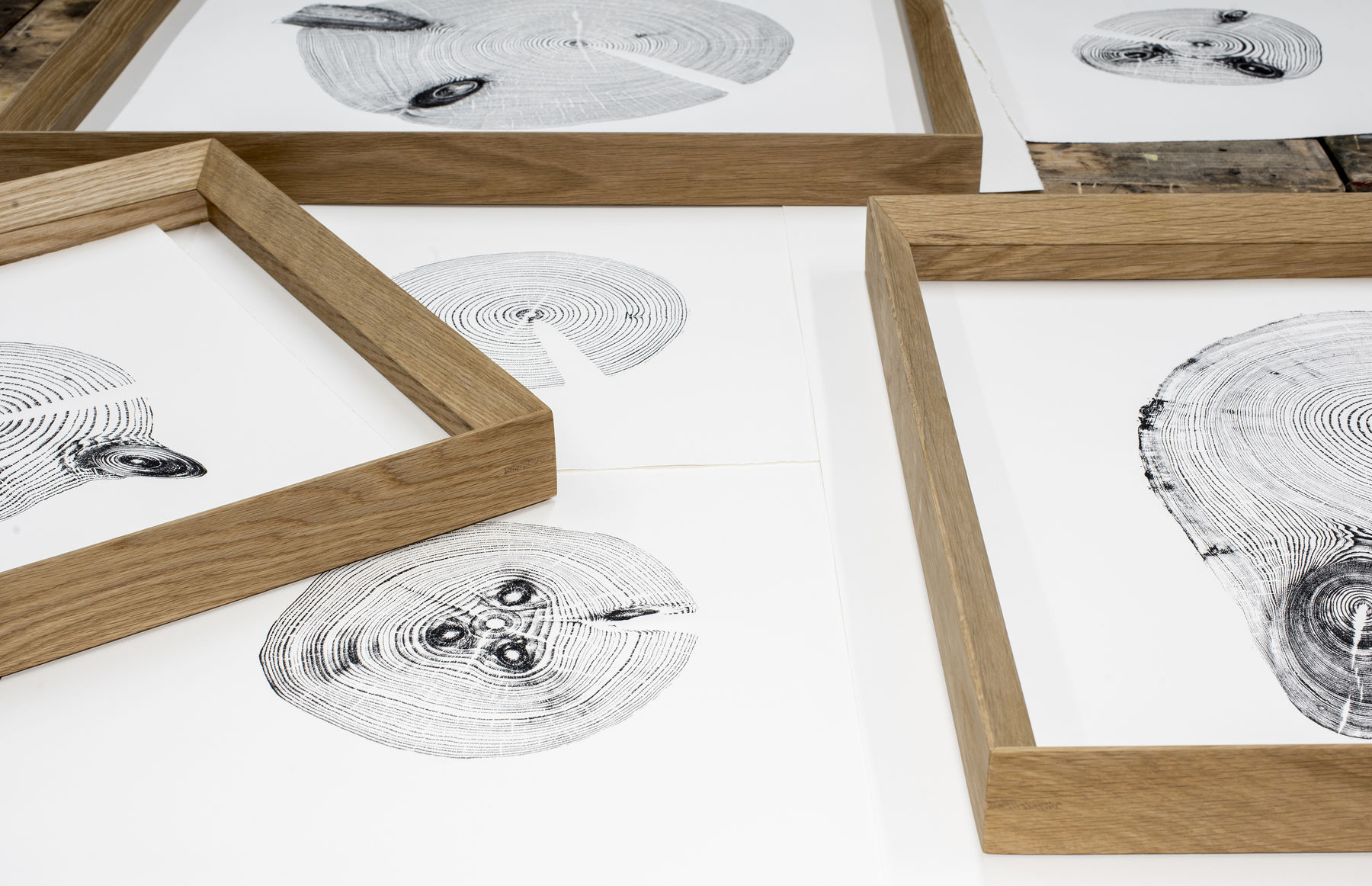 Wood prints on paper and wooden frames.